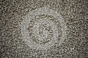 Chiseled concrete faÃÂ§ade close-up texture photo